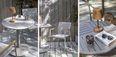 Caféset i grått bestående av ett runt cafébord och stol i matchande nyans