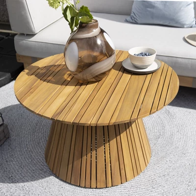 Runt lounge trädgårdsbord i akaciaträ.