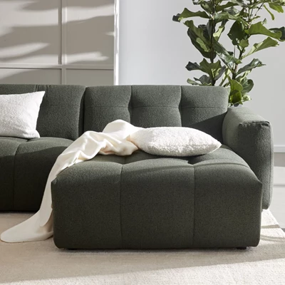 Modulsoffa med schäslong i grön färg