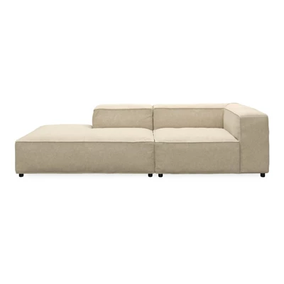 Modulsoffa i beige med puffavslutning på vänster sida