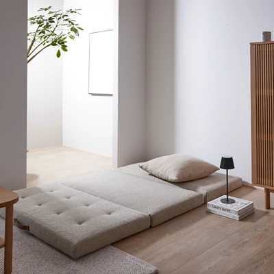 Utslagen vikmadrass i beige