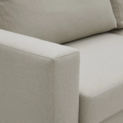 Närbild av armstöd i vitt.