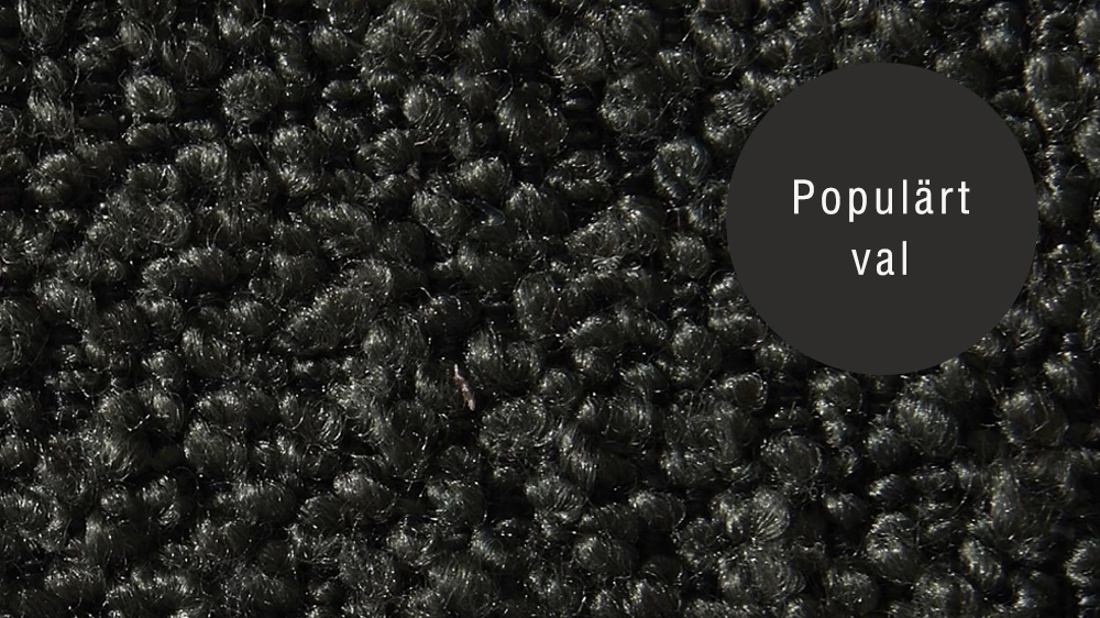 Närbild på Crush-tygprov i nyansen forest