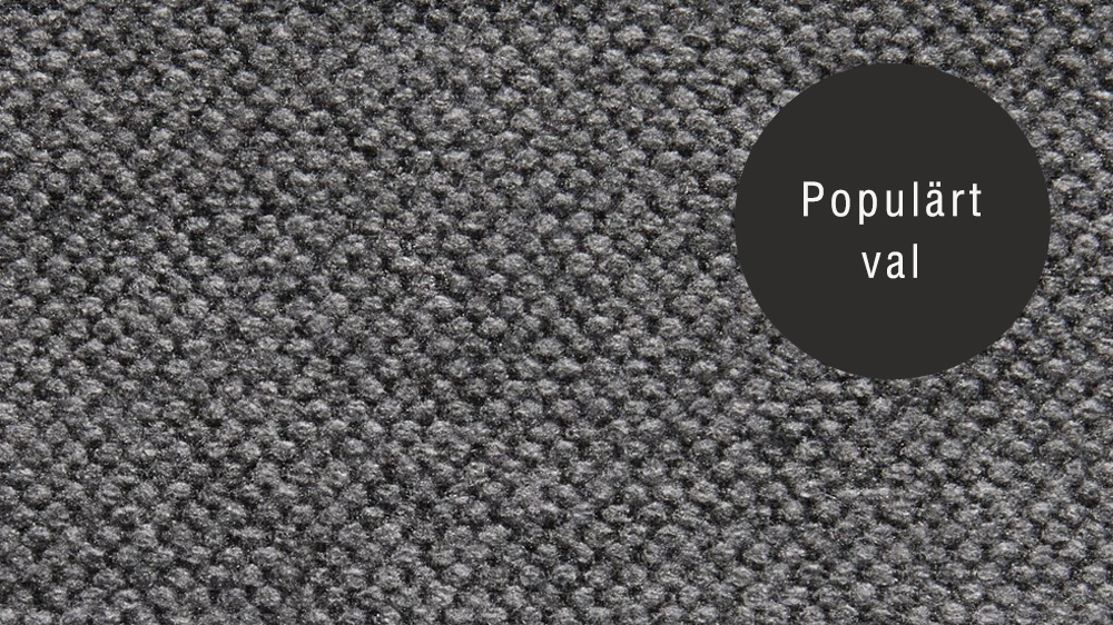 Närbild på tygprov av Denno i nyansen deep grey