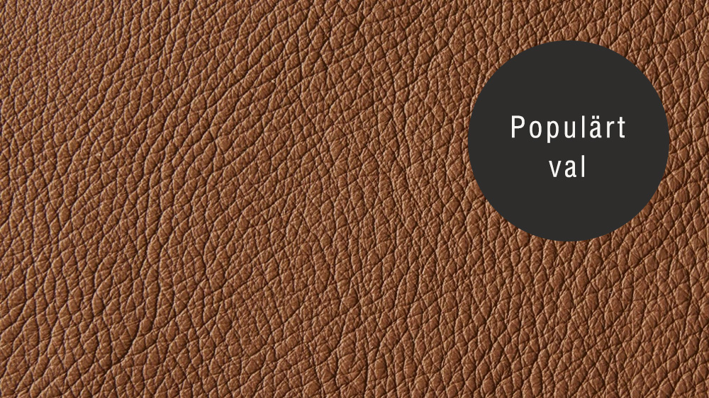 Närbild på tygprov i Narv läder i nyansen cognac