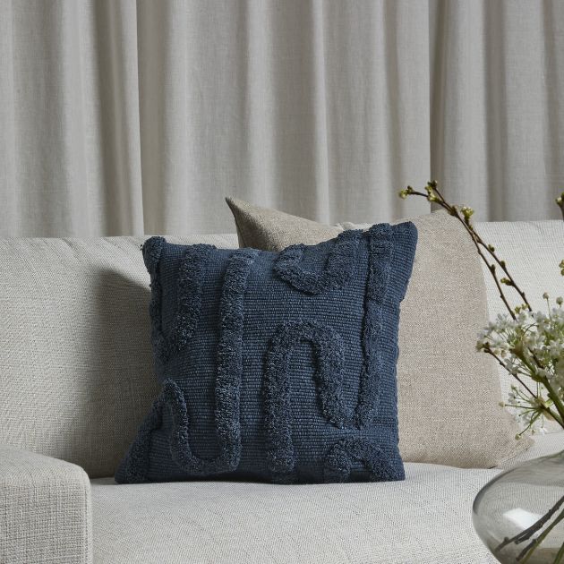 Örngott i blått tyg med mönster