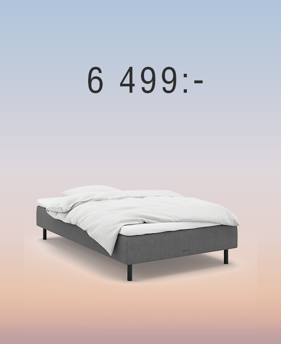 Grå resårbotten mot regnbågsfärgad bakgrund