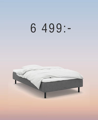 Grå resårbotten mot regnbågsfärgad bakgrund