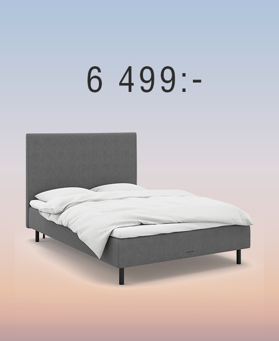 Grå resårbotten med gavel mot regnbågsfärgad bakgrund