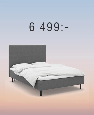 Grå resårbotten med gavel mot regnbågsfärgad bakgrund