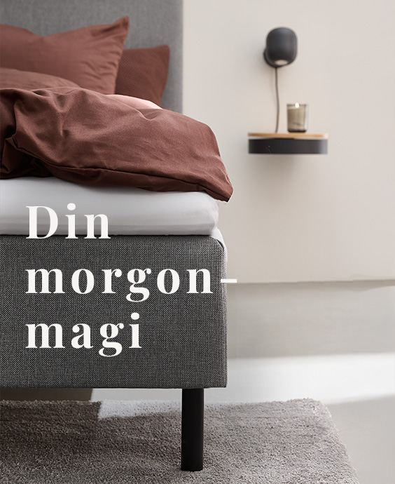 Grå boxmadrass med texten: "Din morgonmagi"