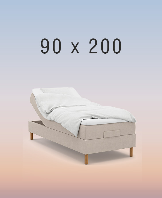 Ljusgrå ställbar säng på regnbågsfärgad bakgrund