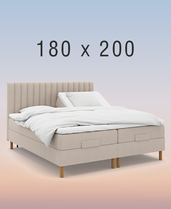 Ljusgrå ställbar säng på regnbågsfärgad bakgrund