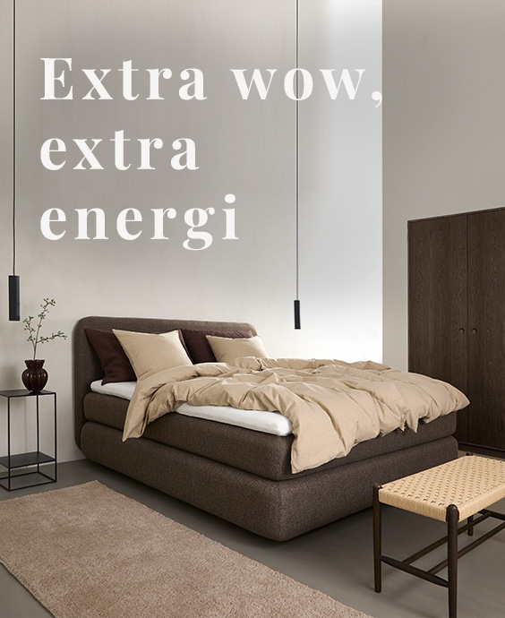 Grå kontinentalsäng i ett mysigt sovrum