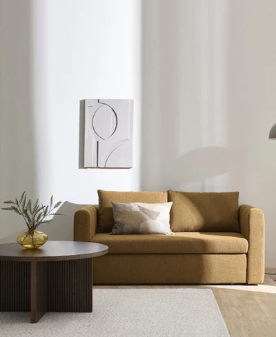 Gul bäddsoffa i stilren design