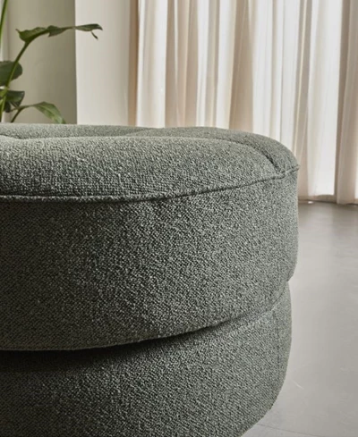 Närbild av grön bäddsoffa i två lager