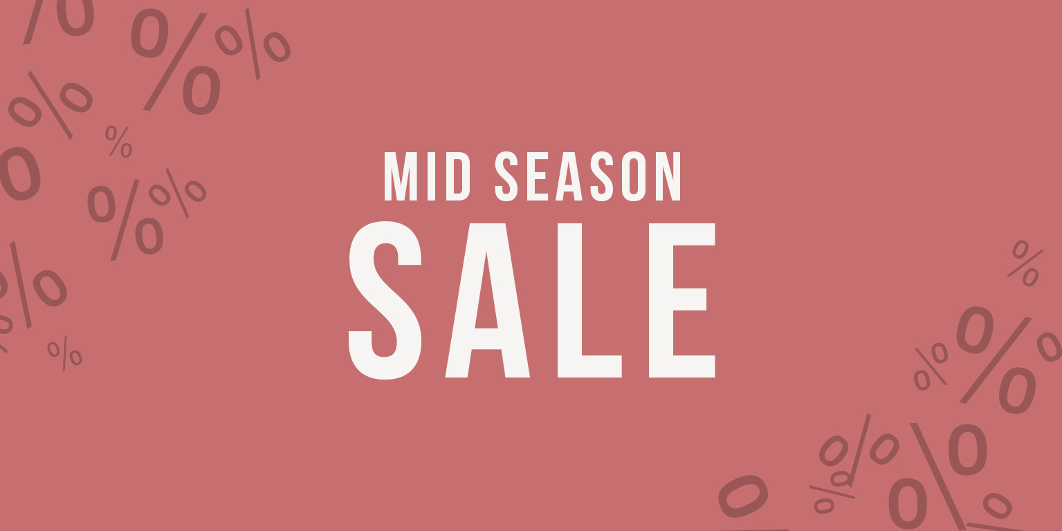 Rosa affisch med texten "Mid Season Sale" och procenttecken i bakgrunden för reaerbjudande.