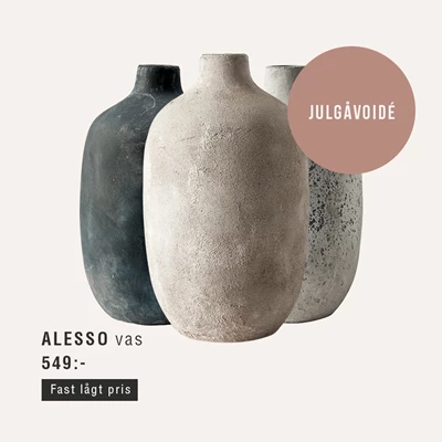 Organiska stenvaser mot beigefärgad bakgrund.