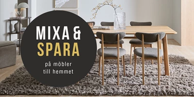 mix-spar-paa-moebler-til-hele-hjemmet-narrow-se.jpg Modernt matbord med trästolar och grå stoppning på mjuk matta, kampanj för mixa och spara på möbler.