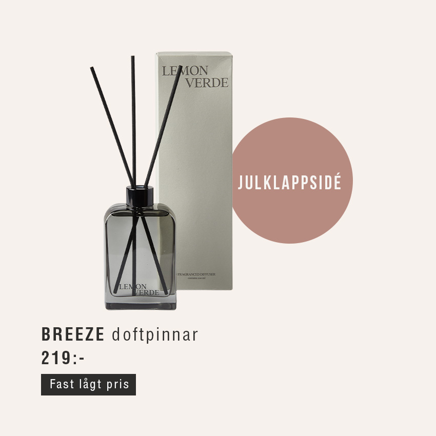 Doftpinnar och förpackning mot beige bakgrund.