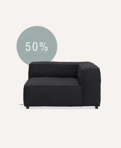 Soffmodul i mörkblått på beige bakgrund