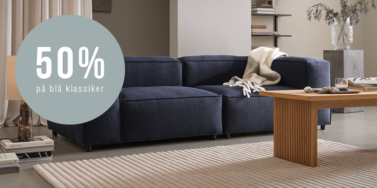 Blå modulsoffa i vardagsrum