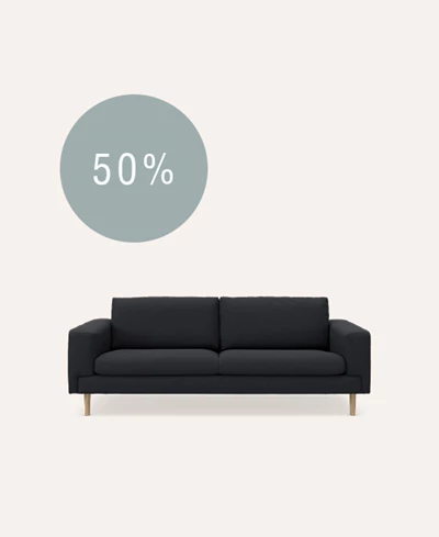 2-personers blå sofa på beige baggrund