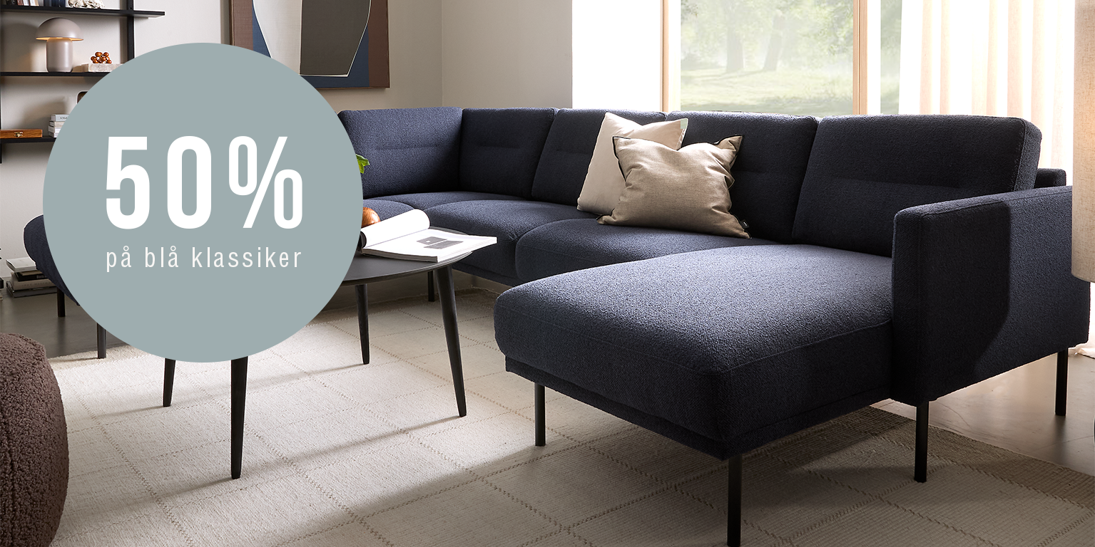 Blå modulsoffa i vardagsrum