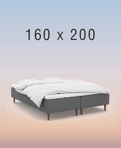 Grå resårbotten på regnbågsfärgad bakgrund