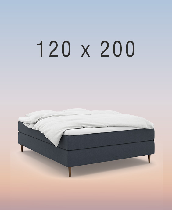 Ljusgrå ställbar säng på regnbågsfärgad bakgrund