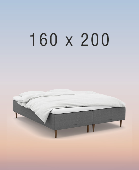 Ljusgrå ställbar säng på regnbågsfärgad bakgrund