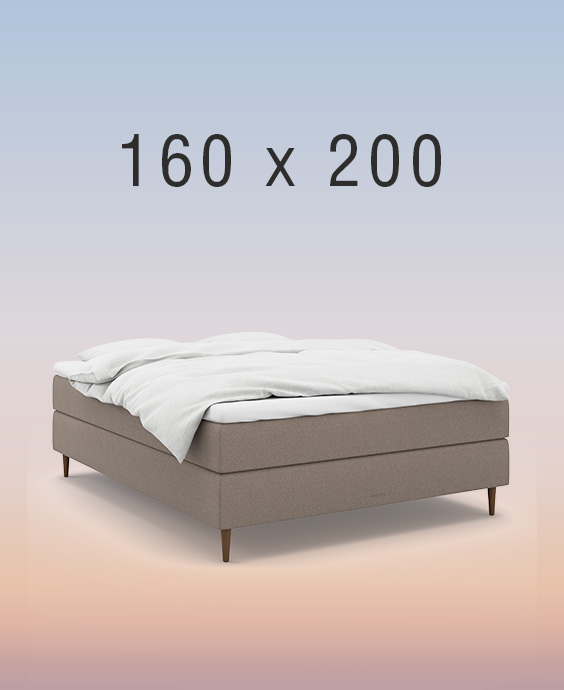 kontinentalsäng i ett mysigt sovrum