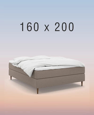 kontinentalsäng i ett mysigt sovrum