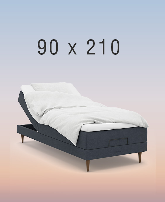 ställbar säng på regnbågsfärgad bakgrund