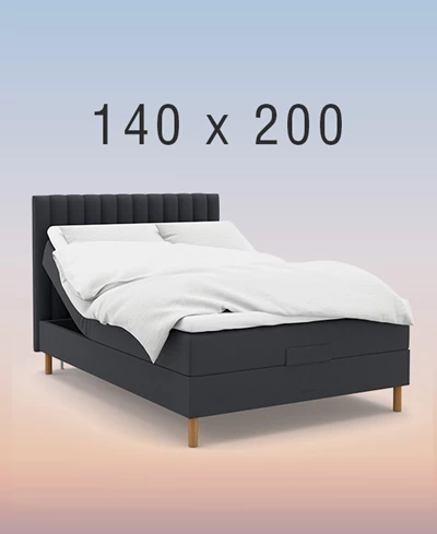 ställbar säng på regnbågsfärgad bakgrund