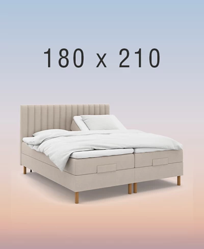 ställbar säng på regnbågsfärgad bakgrund