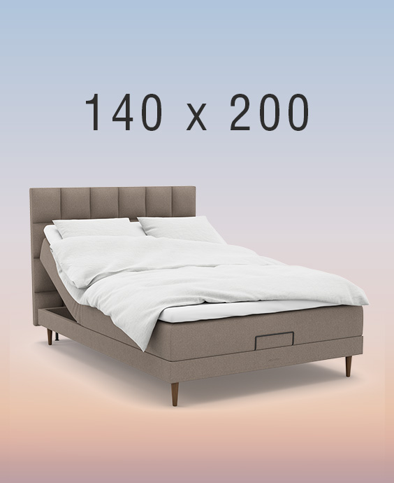 Grå elevationsseng på regnbuefarvet baggrund