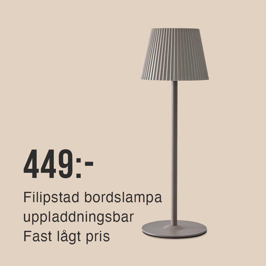 Uppladdningsbar bordslampa på beige bakgrund