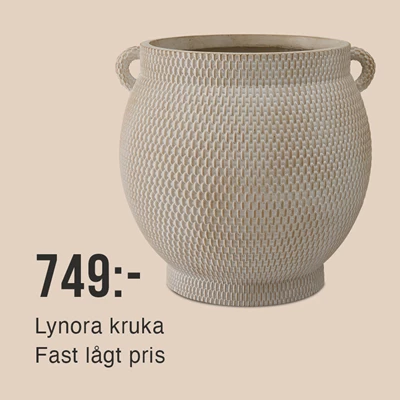 Grå kruka på beige bakgrund