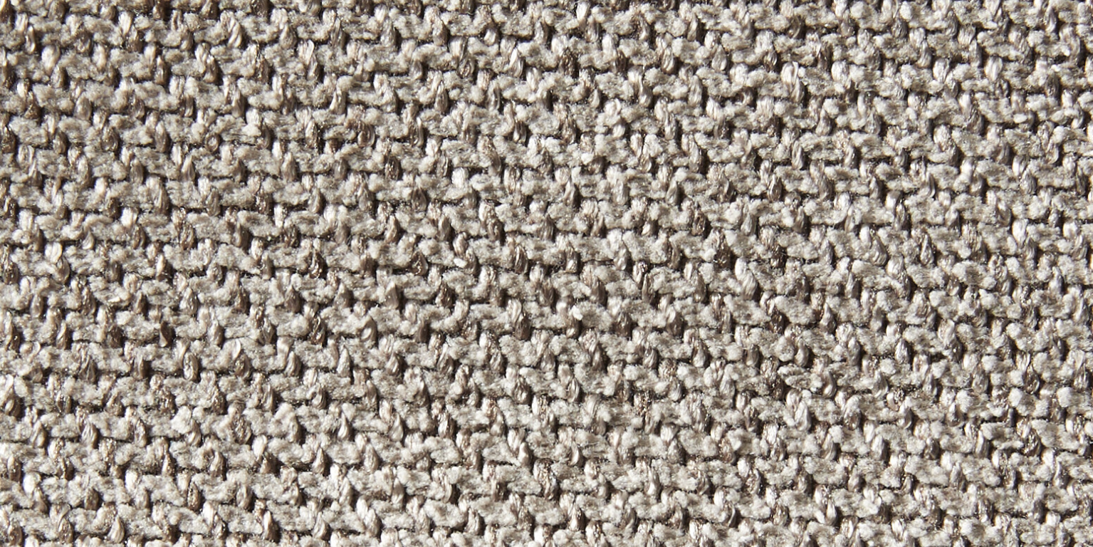 Tygprov i beige nyans.