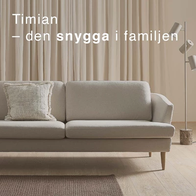 2-sits klassisk soffa i vit färg.