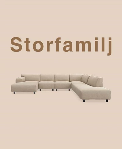 U-formad modulsoffa mot beige bakgrund.