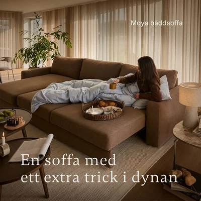 Aw26 16 Moya (2) Kvinna som slappnar av i en utfälld bäddsoffa
