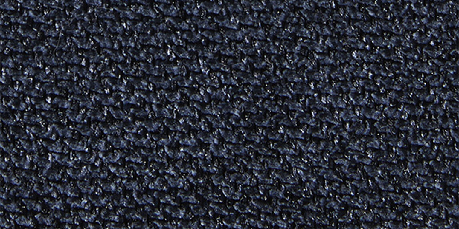 Närbild av textilen Deep Blue – Austin 15 med en djup blå nyans och melerad, vävd struktur.