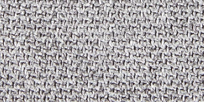 Närbild av textilen Grey – Austin 18 med en neutral grå nyans och melerad, vävd struktur.