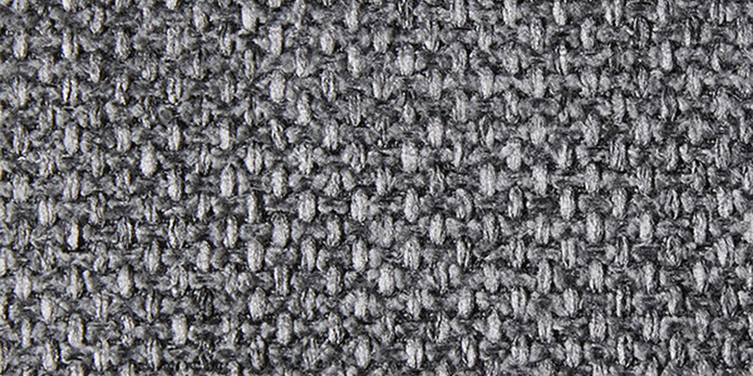 Närbild av textilen Niagara – Rate 158 med en blågrön nyans och melerad, vävd struktur.